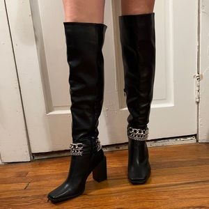 black over the knee high heeled boots. never been worn